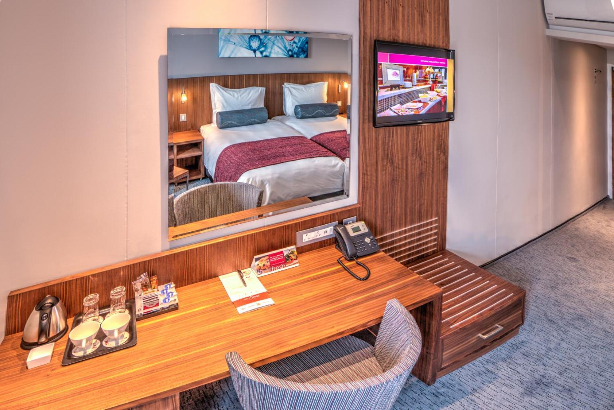 ซิตี้ ลอดจ์ โฮเต็ล วอเตอร์ฟอล ซิตี้ โยฮันเนสเบิร์ก Hotel มิดแรนด์ ห้อง รูปภาพ